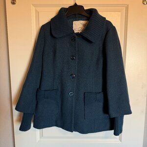 Woman's jacket with bow pockets